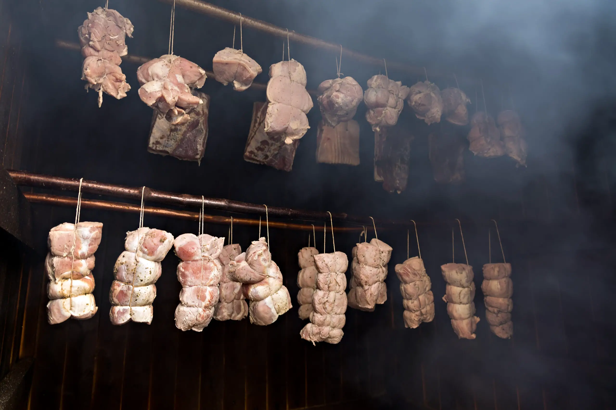 smoking meat in the traditional smokehouse
