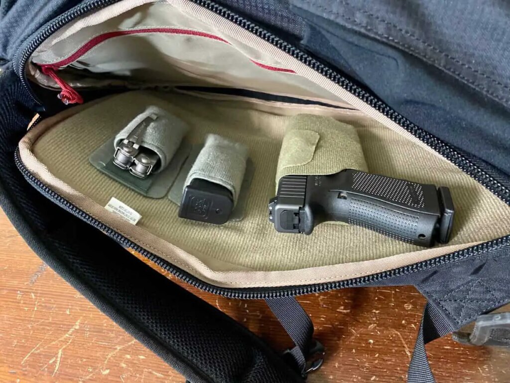 Is Carrying a Gun in a Backpack Considered Concealed? Option Gray